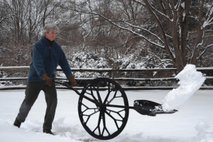 Snow Wolf Wheeled Shovel Goes Easy On Your Back