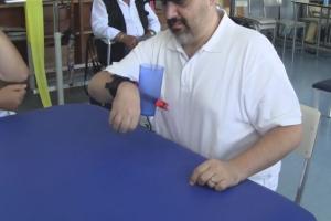 Soft SixthFinger: Wearable EMG Controlled Robotic Finger