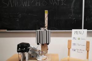 Sandwich-o-matic: Voice Controlled Sandwich Making Robot
