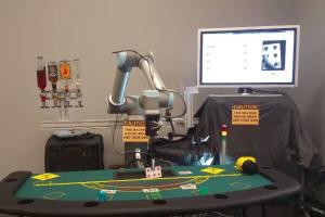 UR10 Robot Arm As a Blackjack Dealer