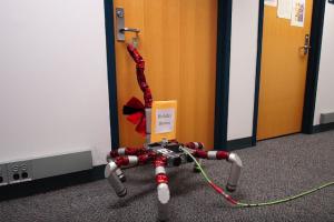 Snake Monster Robot Opens Doors To Make Delivery