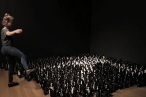 Using a Group of Robot Penguins As a Mirror