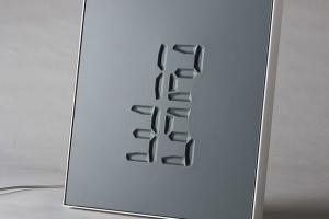 Etch Clock Engraves the Time