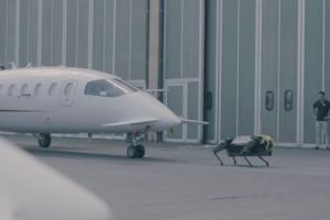 HyQReal Robot Pulling a Passenger Plane