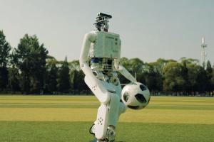 Tsinghua’s Soccer Playing Bipedal Robot
