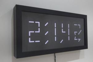 Superluminal Motion Clock Tells Time with 24 Mini Clocks