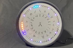 Stargate Inspired NeoPixel LED Clock by CognitoLabs