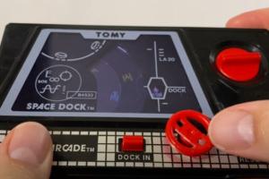 Tomy Pocket Arcade Space Dock: Wind Up Game from 1982