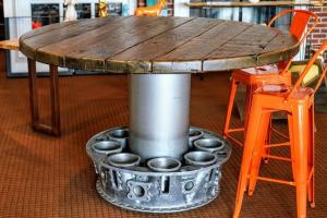 Rustic Refinery’s Jet Engine Pub Table for Aviation Enthusiasts