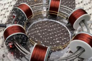 6-Coil Electromagnetic Cyclotron Tested