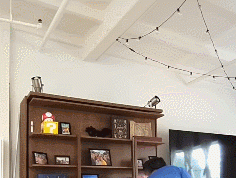 Expand Furniture’s Compatto Wall Bed Revolving Bookcase Table