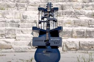 Kuzma Robotic Self-Playing Guitar Can Play Any Song